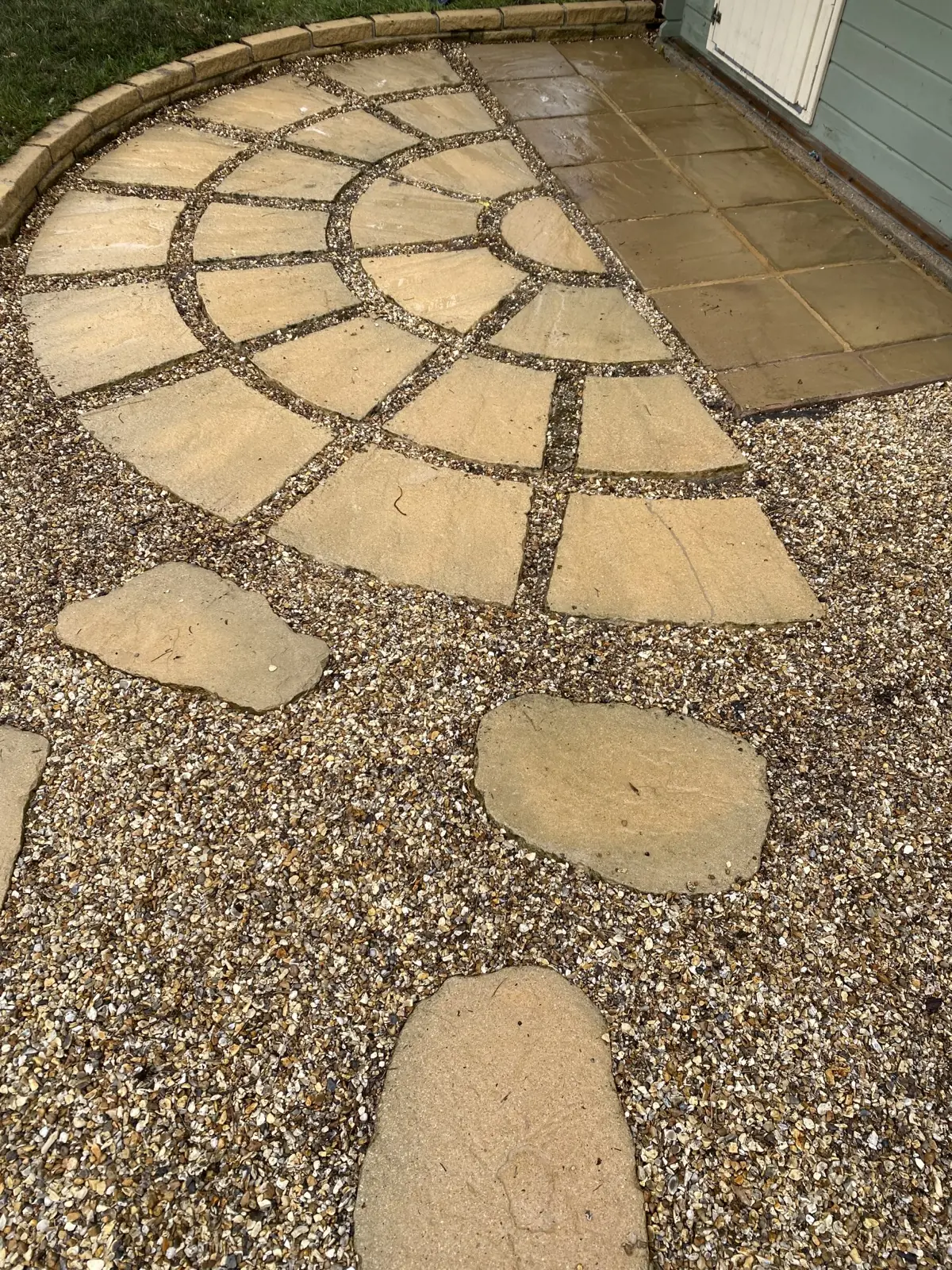 Sandstone patio circle cleaned back to golden stone